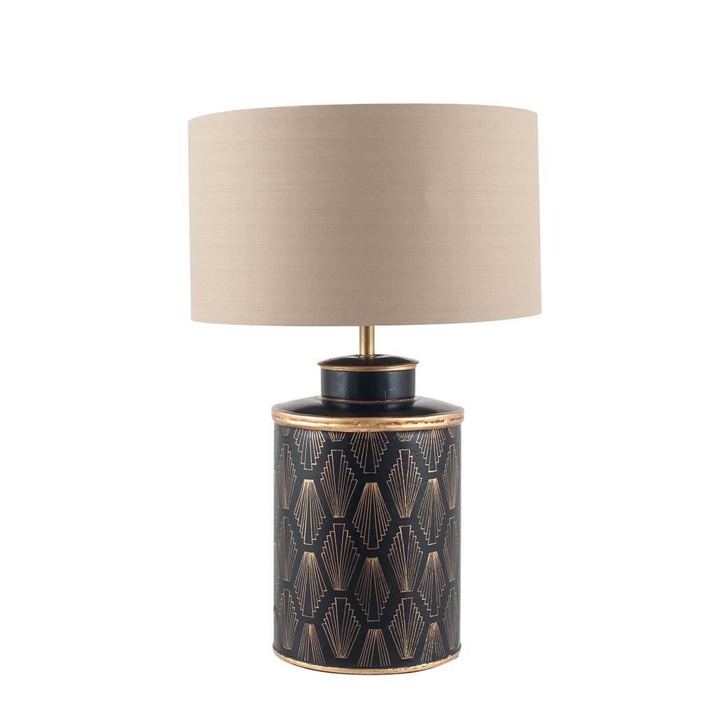 A hand painted black and gold metal table lamp base with a geometric art deco pattern, featuring a gold art deco style arch pattern on a black iron base.
