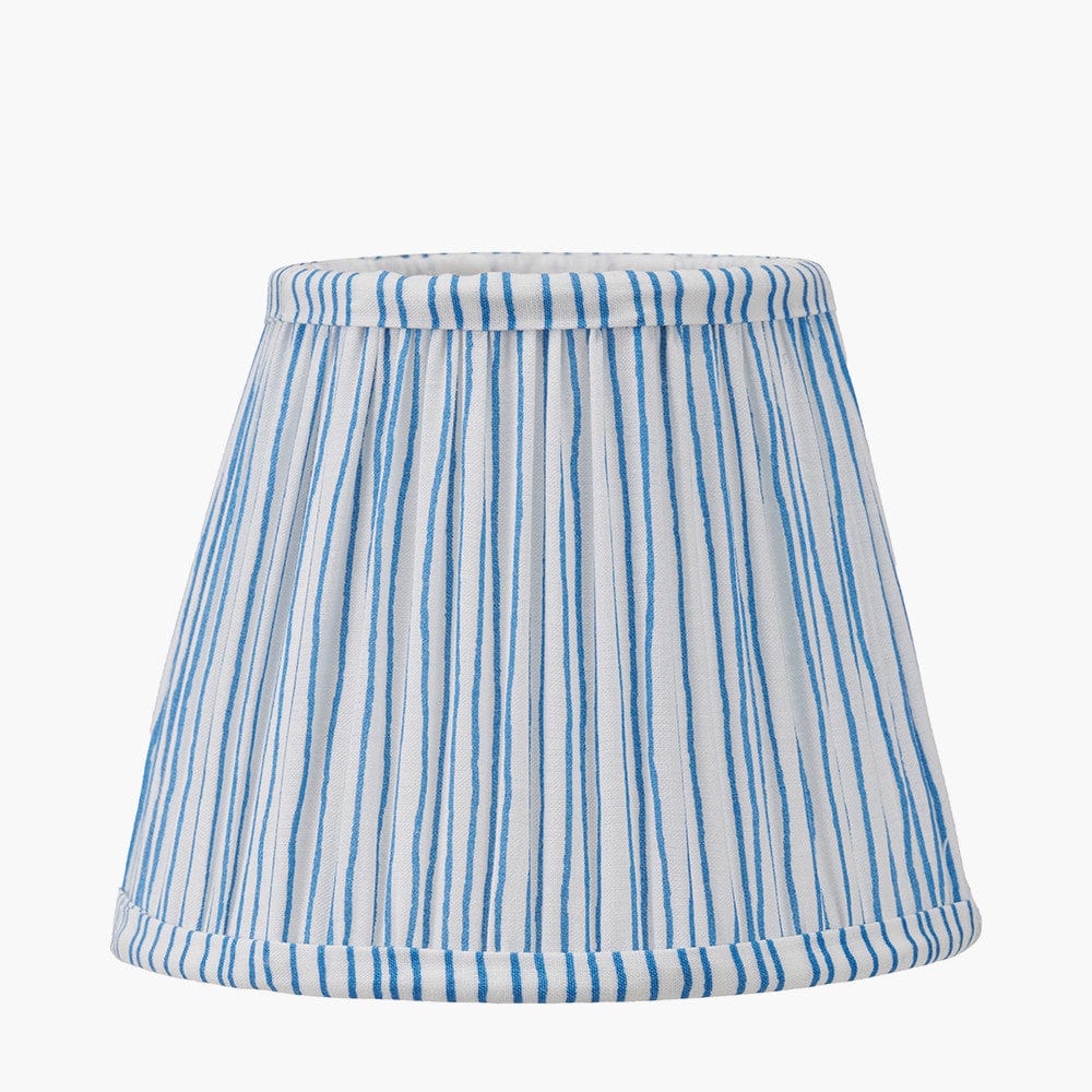 Striped lampshade with blue and white pattern on a white background