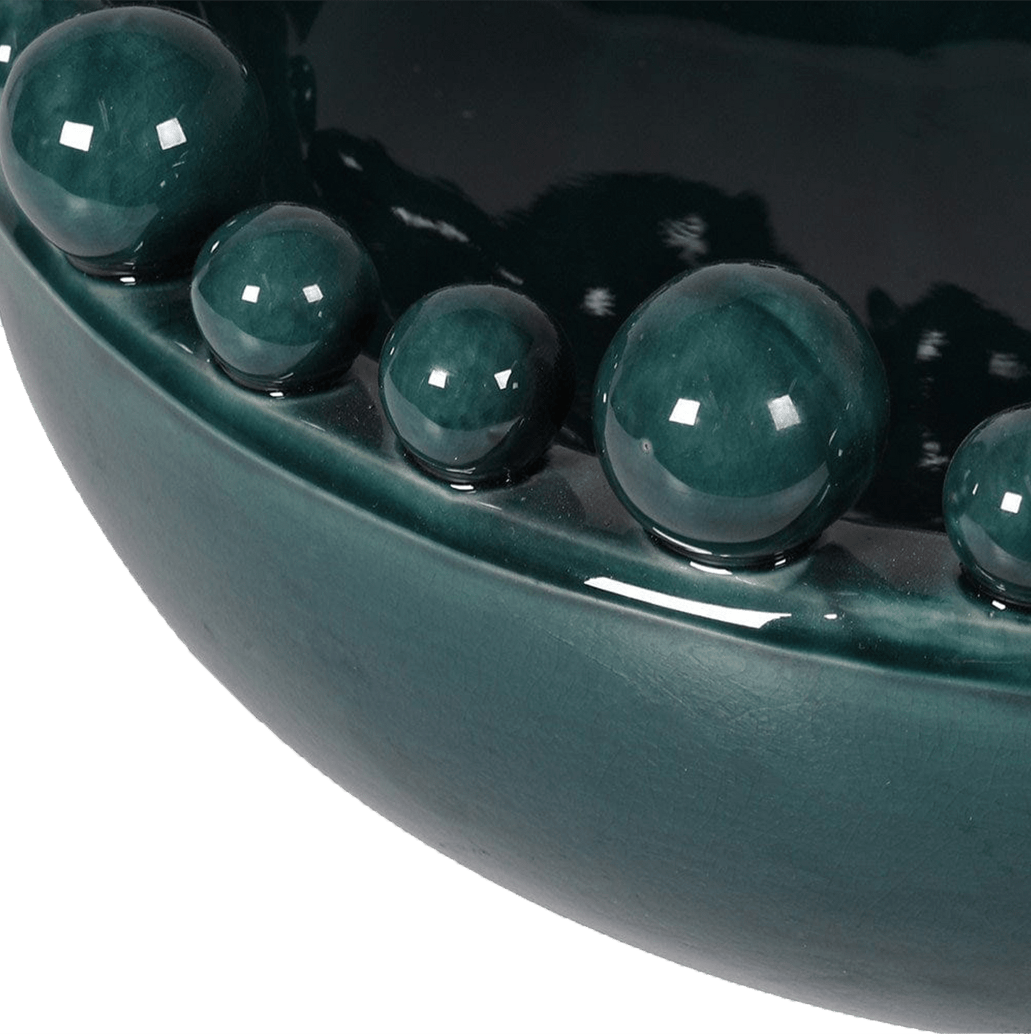 Teal ceramic bowl with glossy finish an d teal bobbles on the rim