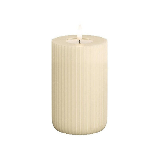 A cream-colored, solid stripe, cylindrical LED candle decoration.
