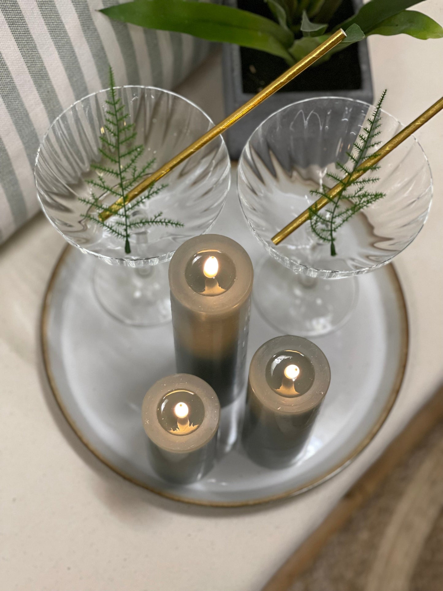 3 LED Candle candles on a plate with two martini glasses