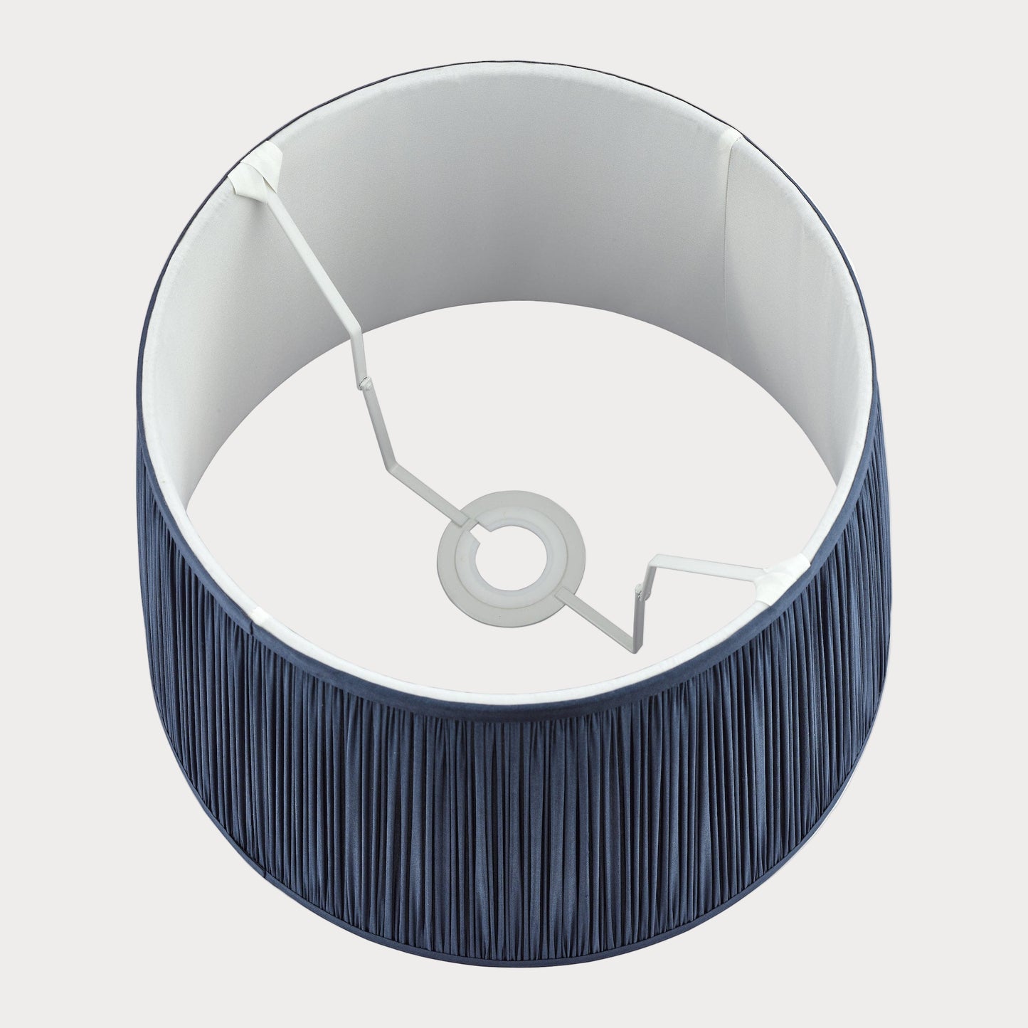 Lampshade with blue and white interior on a white background