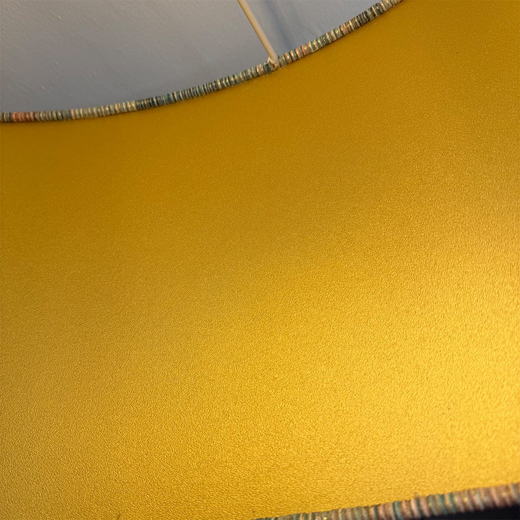 Gold-colored material with a textured surface