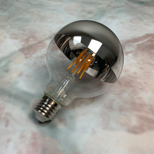 An E27 silver top 95mm globe LED light bulb with a clear glass enclosure and a metallic reflective top.