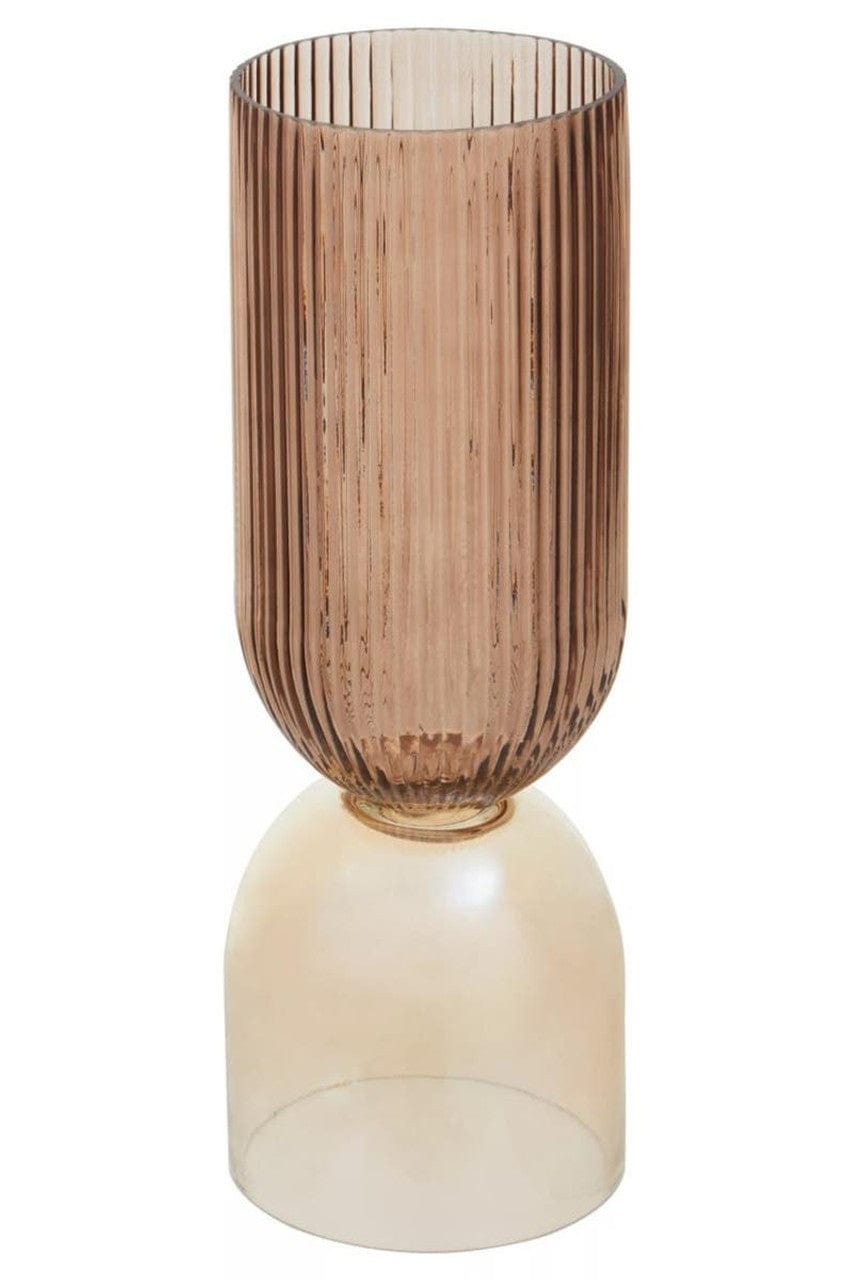 Tall cylindrical vase with ribbed design on a white background