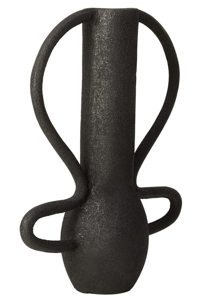 Black vase with twisted design on a white background