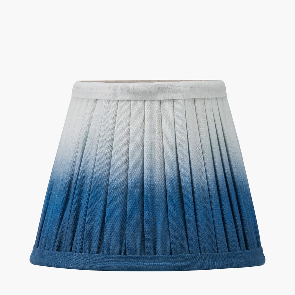 Ombre pleated lampshade transitioning from blue to white