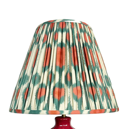 Amrita Red Ceramic & Antique Brass Table Lamp with Ikat Red & Green Tapered Drum Shade