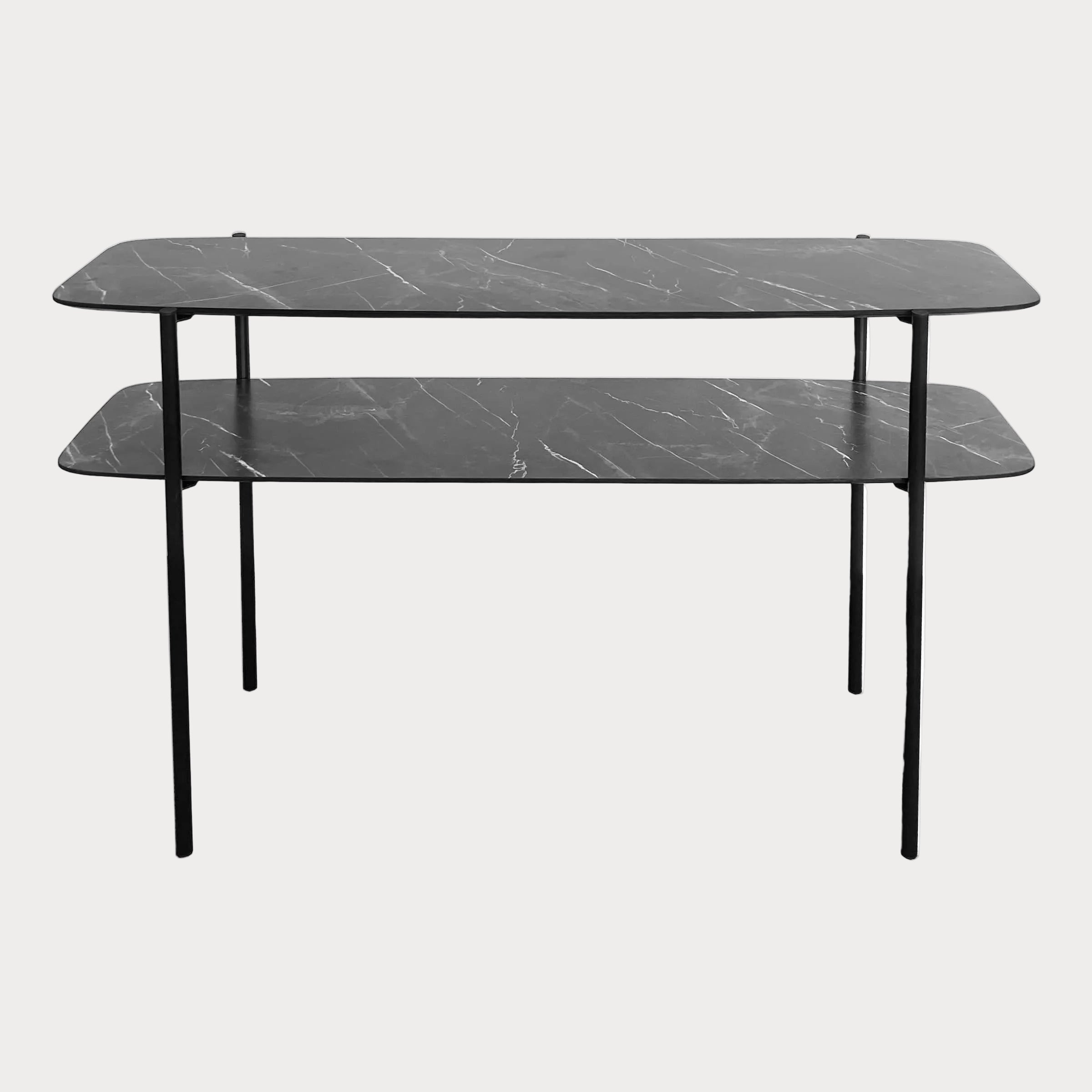 Two-tiered black marble table on a white background