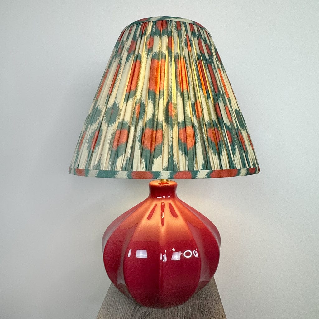 Amrita Red Ceramic & Antique Brass Table Lamp with Ikat Red & Green Tapered Drum Shade