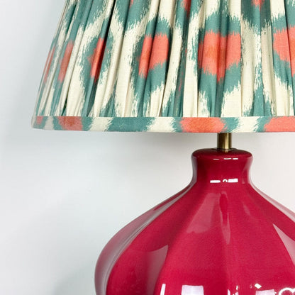 Amrita Red Ceramic & Antique Brass Table Lamp with Ikat Red & Green Tapered Drum Shade