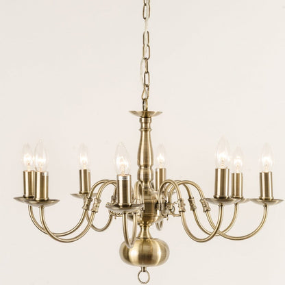 Antwerp 8 Light Antique Brass Flemish Style Chandelier with multiple lights, finished in antique brass.