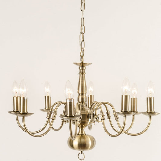 Antwerp 8 Light Antique Brass Flemish Style Chandelier with multiple lights, finished in antique brass.
