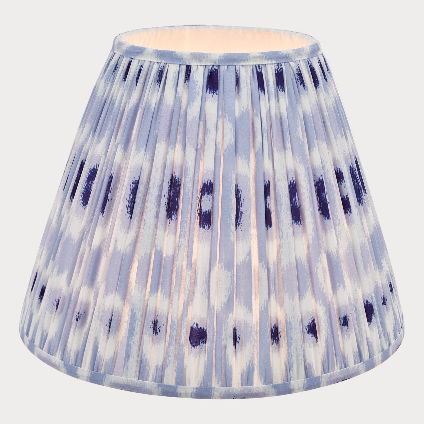 A tapered cotton shade with a blue and white ikat pattern.