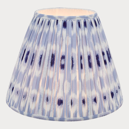 A tapered cotton shade with a blue and white ikat pattern.