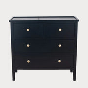 Black dresser with gold knobs on a white background