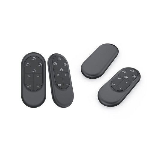 Two black remote controls designed for operating LED candles with timer functions.