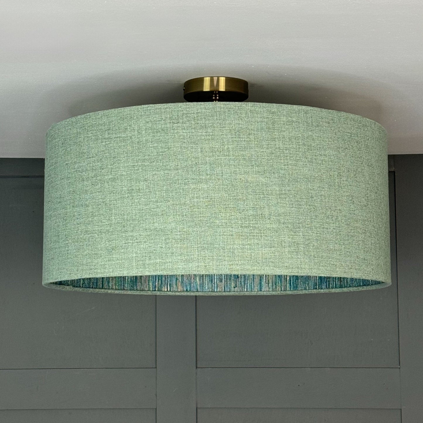 Bronte Jade Pendant Shade with Seri Emerald Peacock Wallpaper Lining