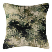 Decorative pillow with a watercolor design in green and black on a white background