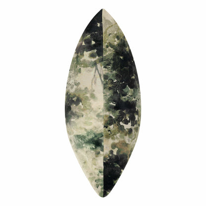 Decorative velvet cushion with green and black watercolour patterns on a white background