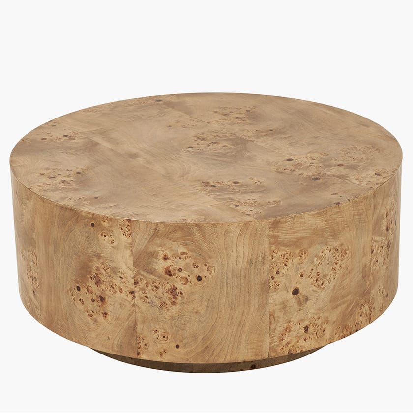 Round wooden coffee table on a white background