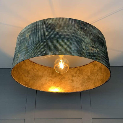 Iguana Electrified Shade with Burnished Golden Wallpaper Lining