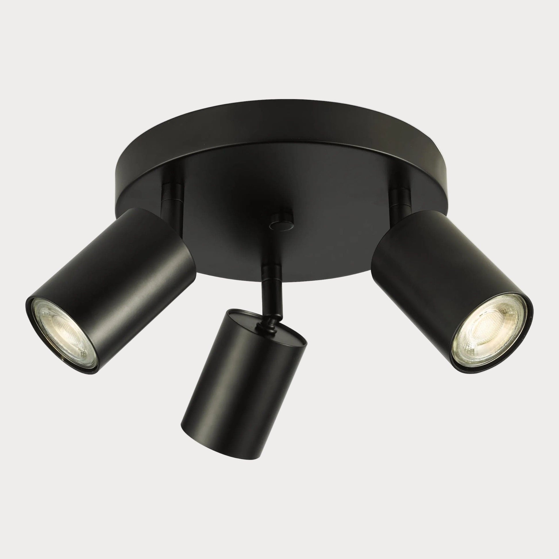 Black three-light ceiling fixture on a white background