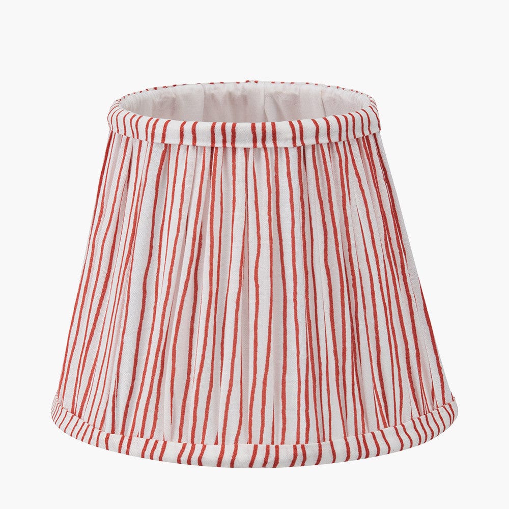 Red and white striped lampshade on a white background