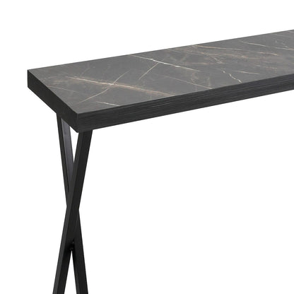 Table with dark marble top and black metal legs on a white background