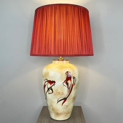 Emerayn Koi Natural Ceramic Table Lamp with Pleated Red Silk Tapered Shade