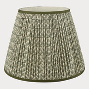 Lampshade with green and beige pattern on a white background