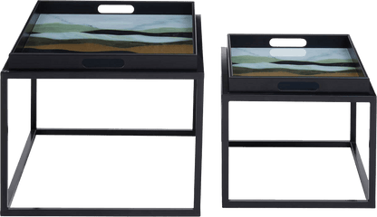Two black serving trays with scenic designs on a transparent background