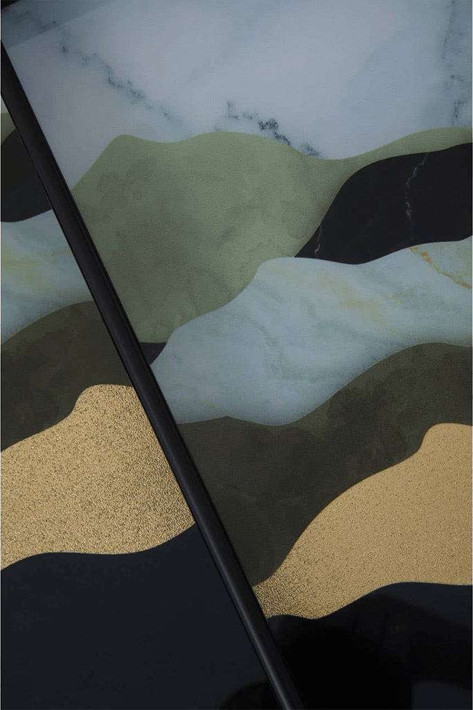 Close-up of a surface with a marble-like pattern in green, brown, and black.