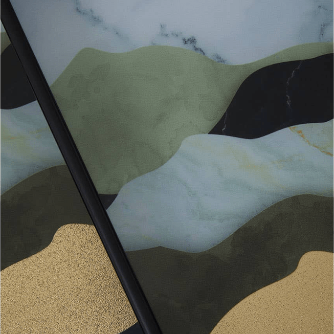 Close-up of a surface with a marble-like pattern in green, brown, and black.