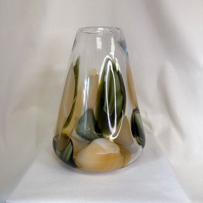 Glass vase with green and brown gradient on a white background