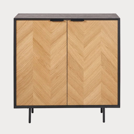 Wooden cabinet with chevron pattern on doors and black frame and legs on a white background