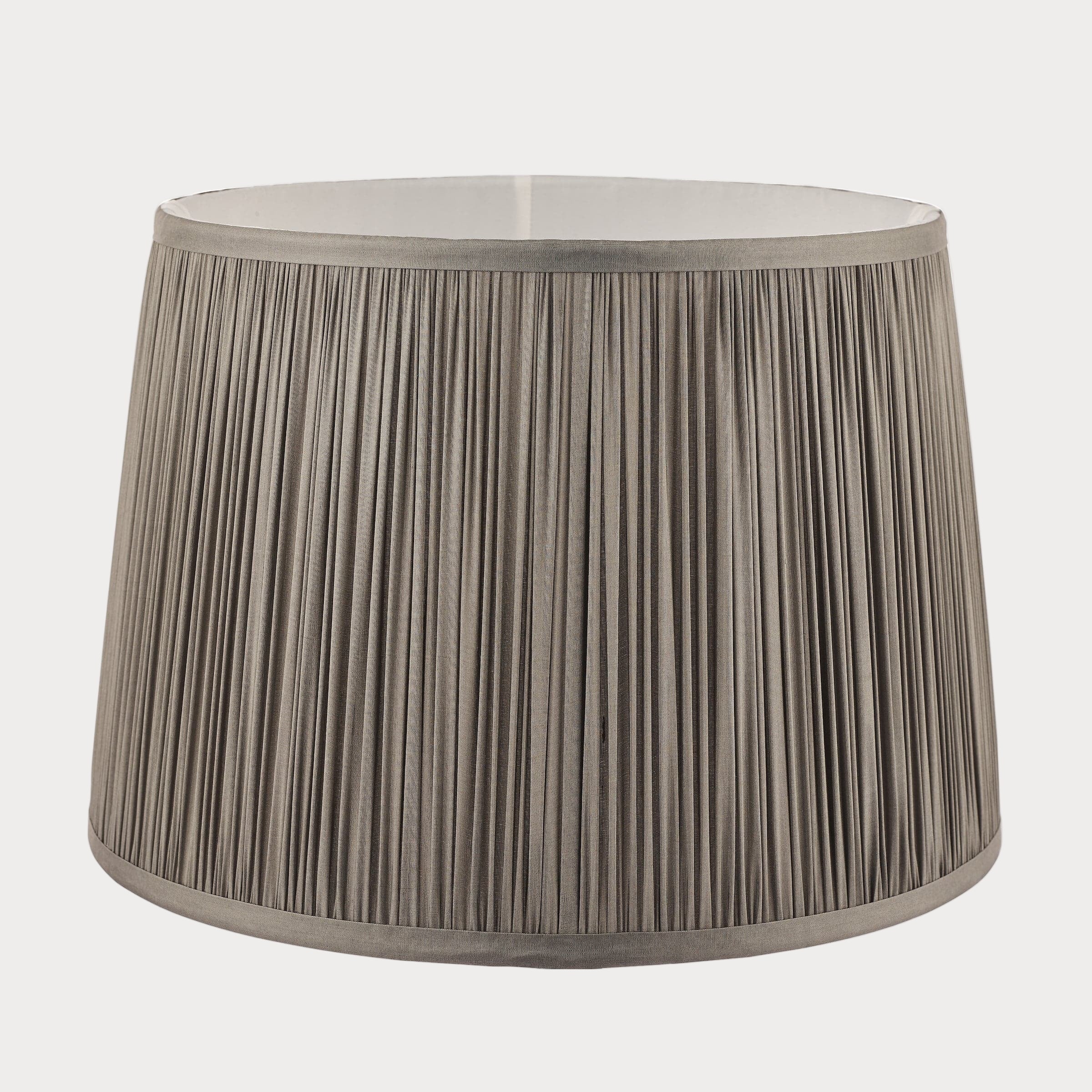 Gray pleated lampshade on a white background
