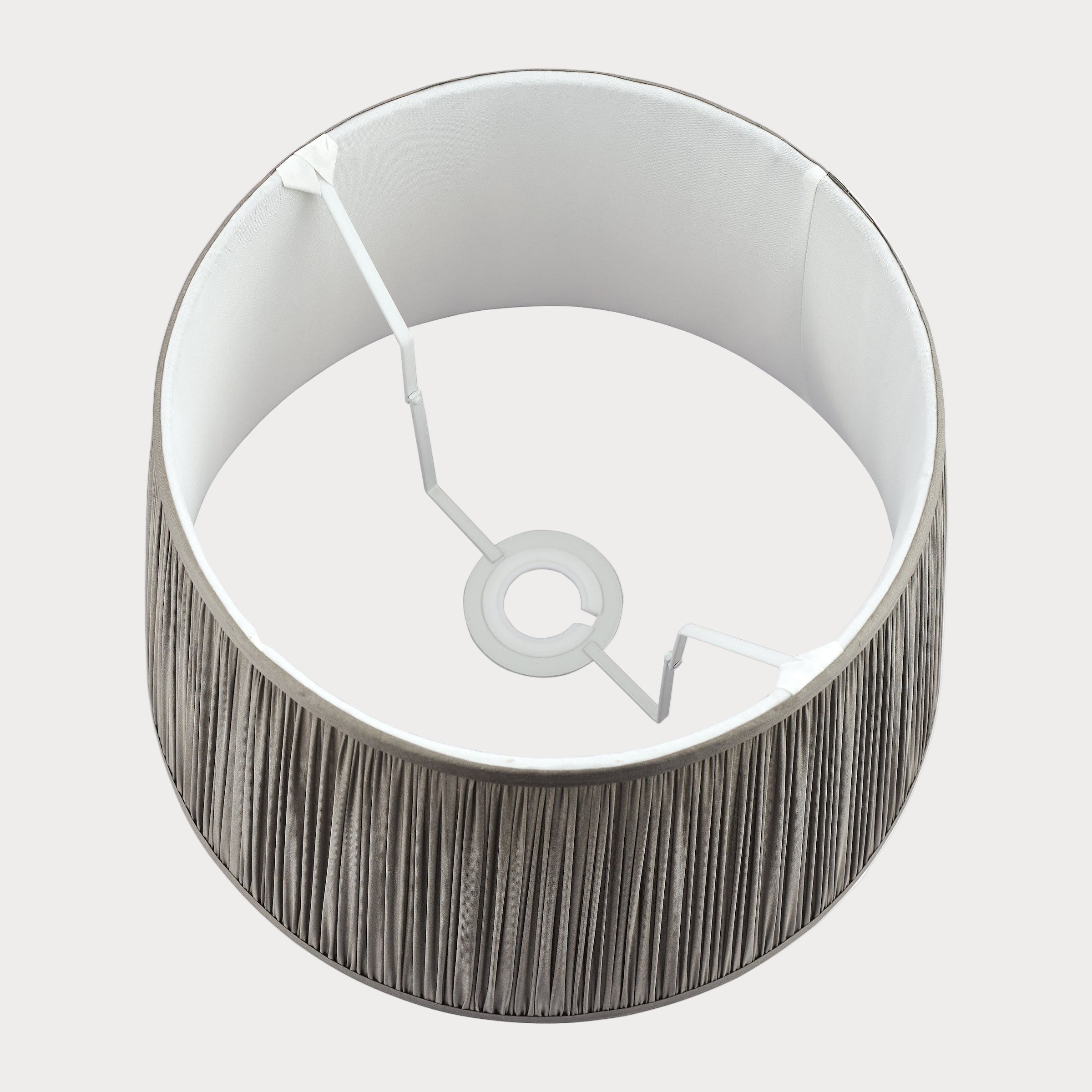 Lampshade with white interior and gray exterior on a white background