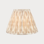 Beige pleated lampshade on a white background