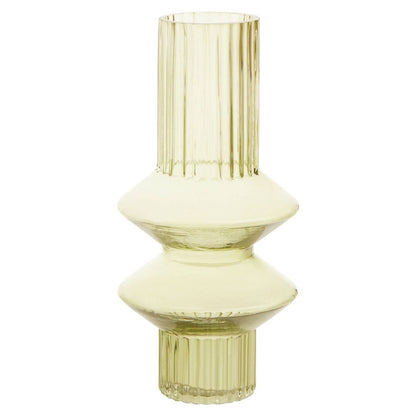 Green glass vase with a textured design on a white background