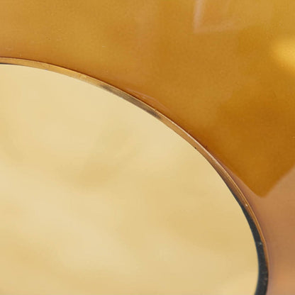 Close-up of a yellow chair with a black rim on a white background