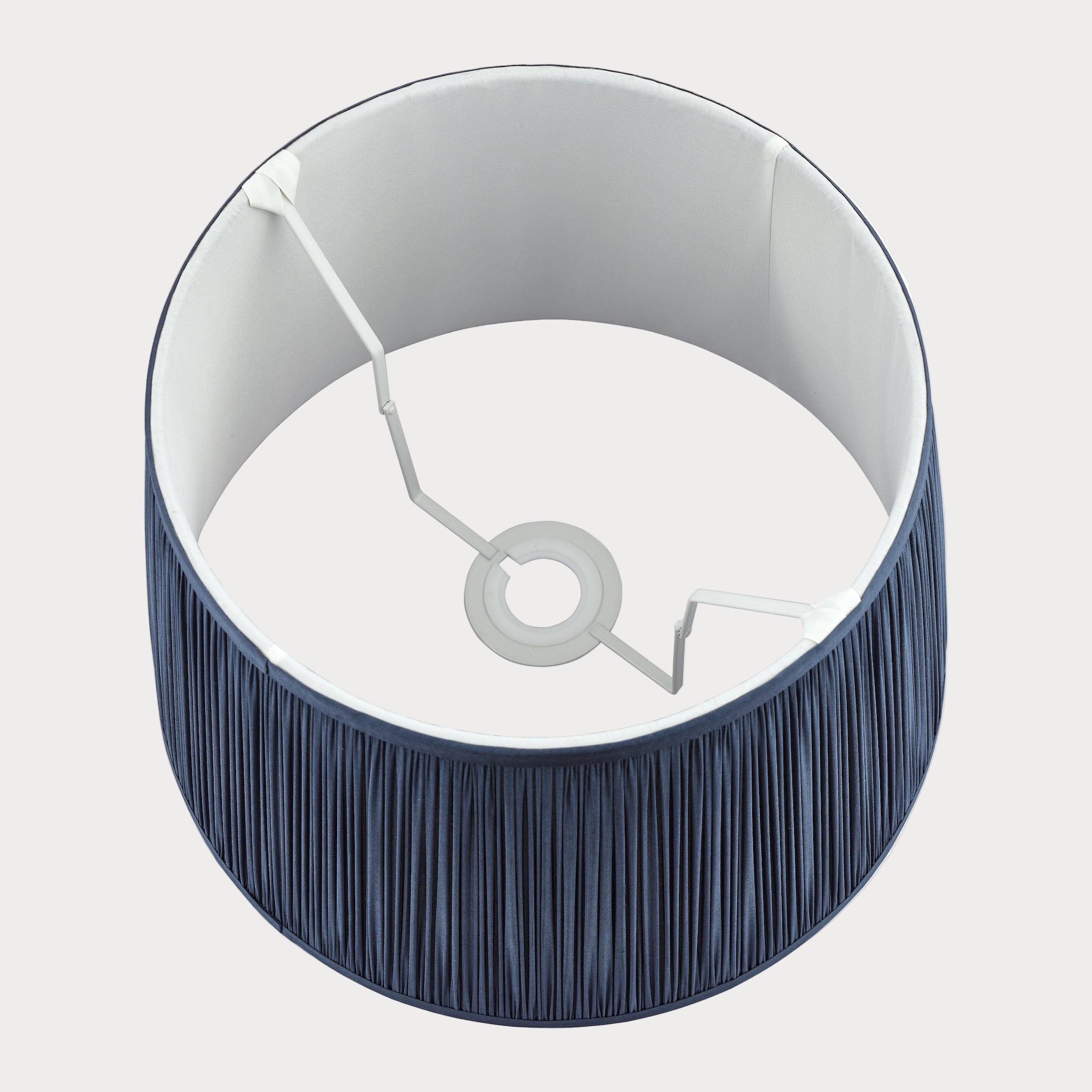 Lampshade with blue and white interior on a white background