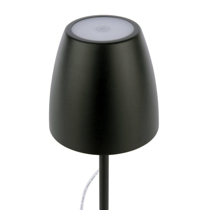 Black outdoor lamp with a white base on a white background