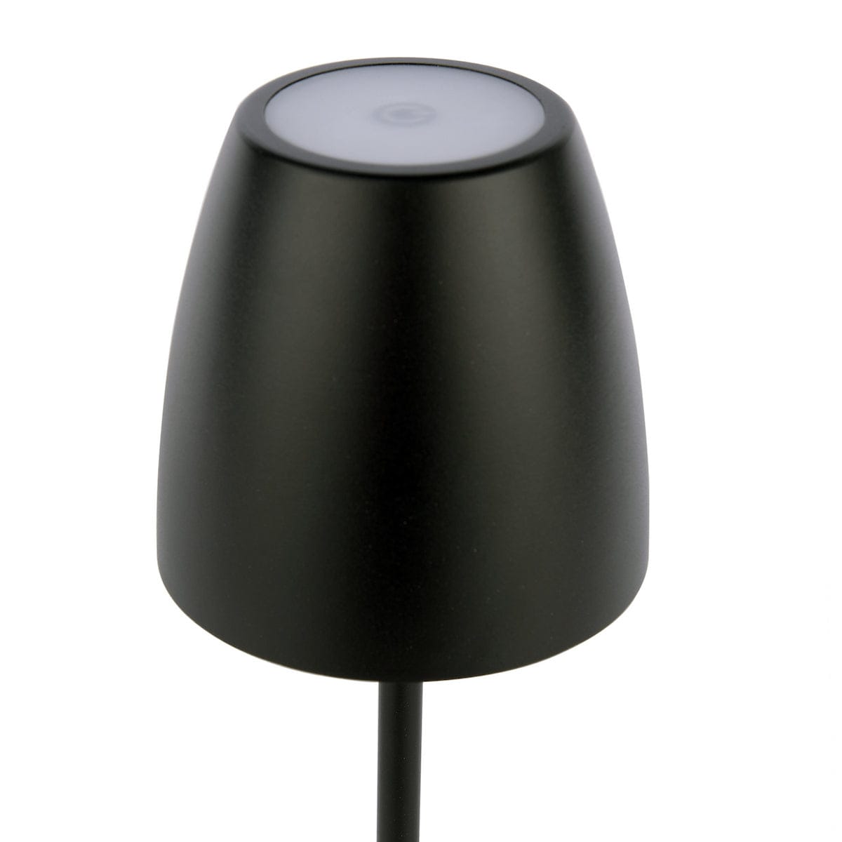 Black outdoor lamp with a white base on a white background