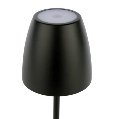 Black outdoor lamp with a white base on a white background