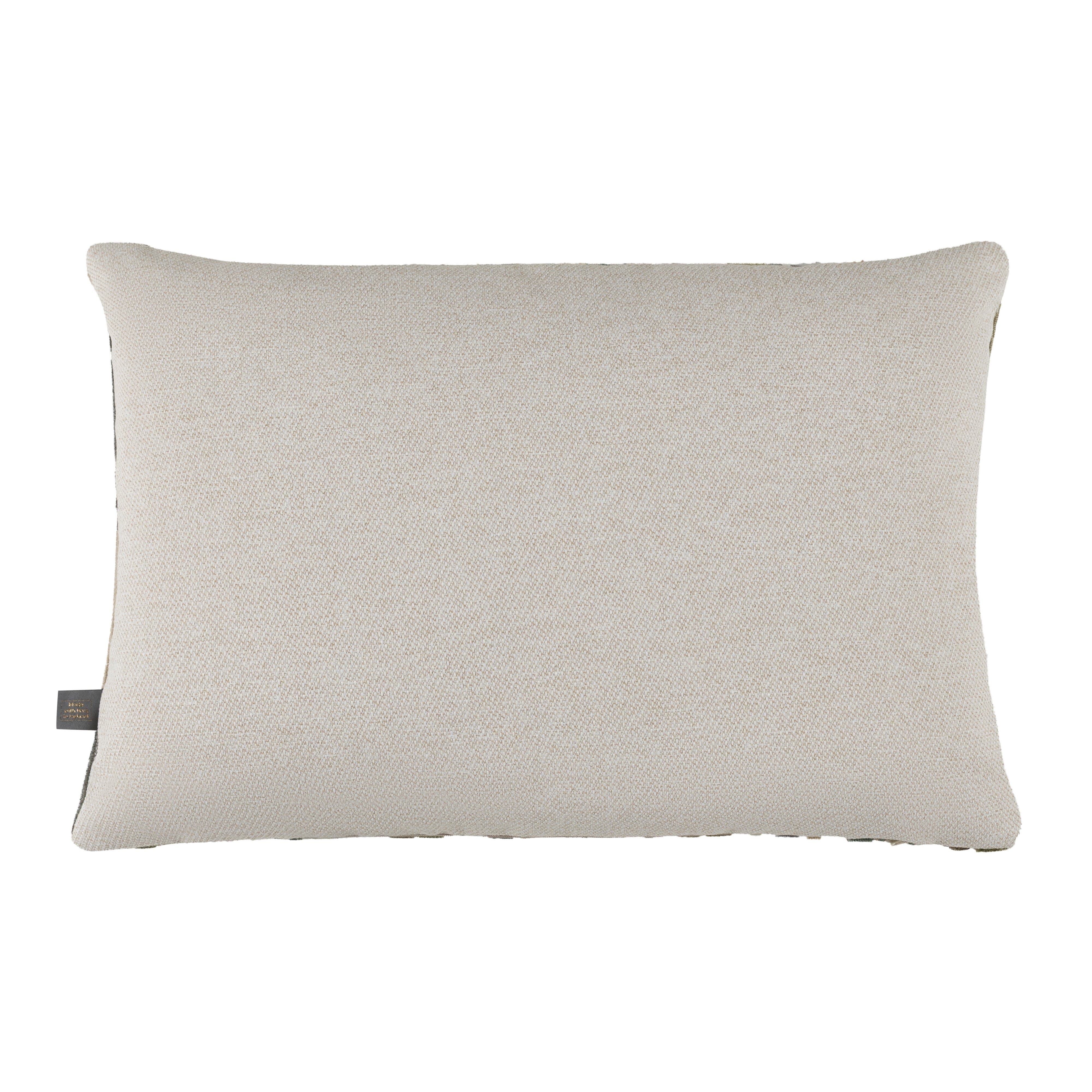 Textured beige pillow on a white background