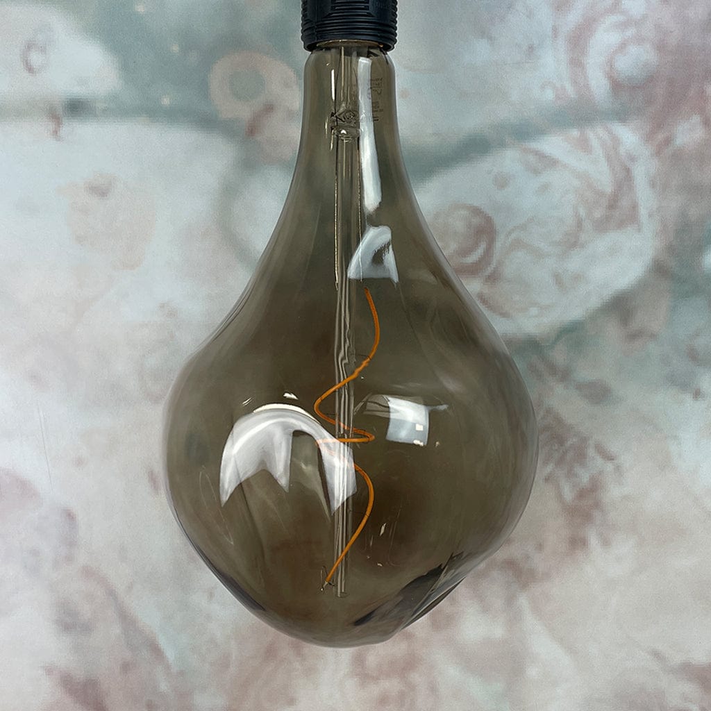 An E27 Organic XXL Natural LED Bulb with a smoked glass enclosure and visible filament inside, hanging