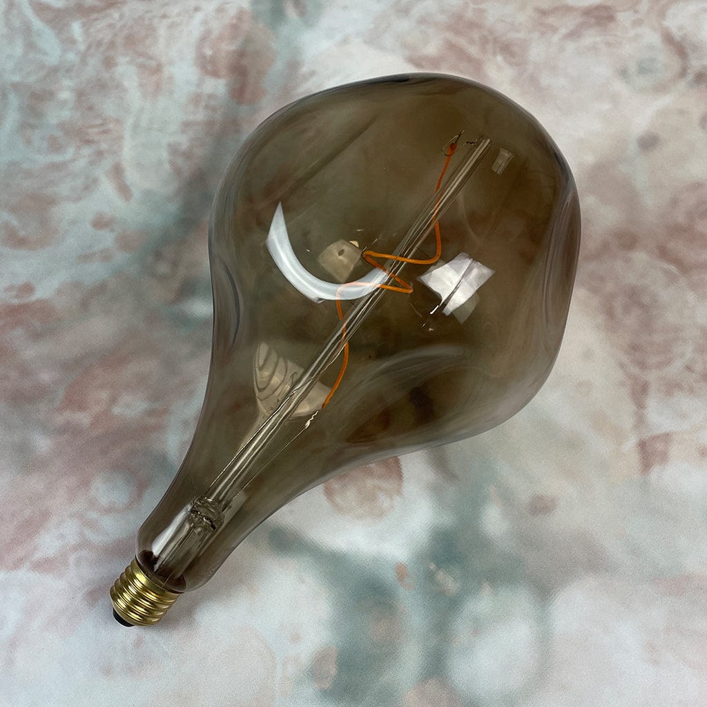 An E27 Organic XXL Natural LED Bulb with a smoked glass enclosure and visible filament inside.