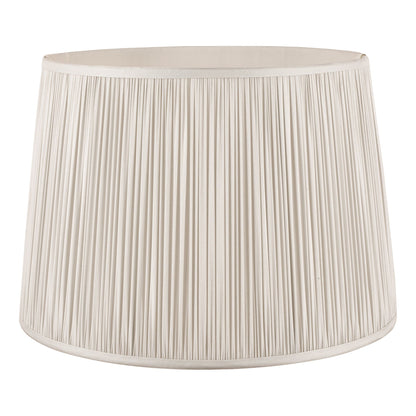 Silver pleated lampshade on a white background