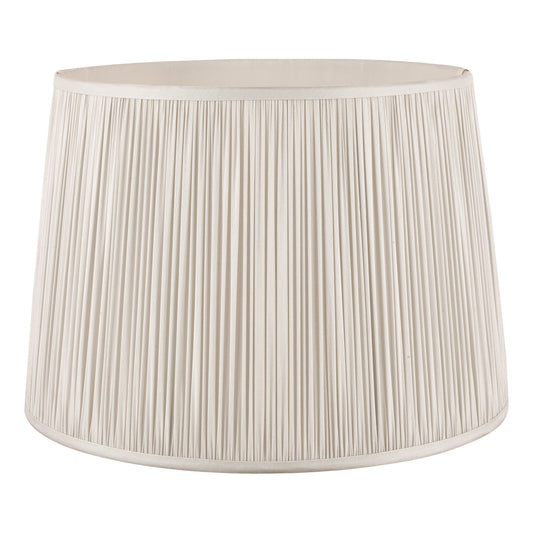 Silver pleated lampshade on a white background